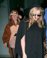 Ke$ha leaves her hotel dressed in leopard printf