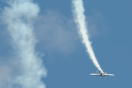 Stunt pilot Dino Moline loses a wing during a display, El Trebol, Santa Fe, Argentina - 15 Aug 2010