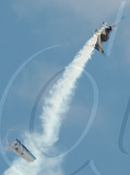 Stunt pilot Dino Moline loses a wing during a display, El Trebol, Santa Fe, Argentina - 15 Aug 2010