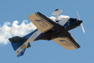 Stunt pilot Dino Moline loses a wing during a display, El Trebol, Santa Fe, Argentina - 15 Aug 2010