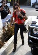 Ashley Tisdale's Louis Vuitton Ipad Accesories Match Perfectly With Her Hairdo