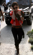 Ashley Tisdale's Louis Vuitton Ipad Accesories Match Perfectly With Her Hairdo