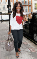 ALEXANDRA BURKE ARRIVING AT HOTEL IN LONDON