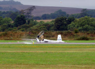 Pilot's dramatic escape after glider crashes into runway, Shoreham, West Sussex, Britain - 22 Aug 2010