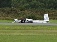Pilot's dramatic escape after glider crashes into runway, Shoreham, West Sussex, Britain - 22 Aug 2010