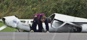 Pilot's dramatic escape after glider crashes into runway, Shoreham, West Sussex, Britain - 22 Aug 2010