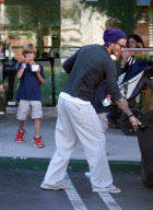 EXCLUSIVE... Exclusive... Despite Scandal, Life Goes on for Dutiful Daddy David Beckham