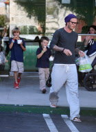 EXCLUSIVE... Exclusive... Despite Scandal, Life Goes on for Dutiful Daddy David Beckham