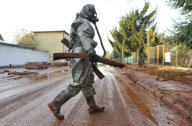 Reservoir containing toxic mud from the nearby Alumina factory leaks into the town of Devecser, Hungary - 05 Oct 2010