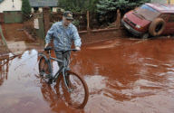Reservoir containing toxic mud from the nearby Alumina factory leaks into the town of Devecser, Hungary - 05 Oct 2010