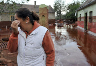 Reservoir containing toxic mud from the nearby Alumina factory leaks into the town of Devecser, Hungary - 05 Oct 2010