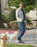 The Mentalist star SIMON BAKER and his wife REBECCA RIGG walking their pooch named HAPPY