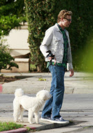 The Mentalist star SIMON BAKER and his wife REBECCA RIGG walking their pooch named HAPPY