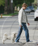 The Mentalist star SIMON BAKER and his wife REBECCA RIGG walking their pooch named HAPPY