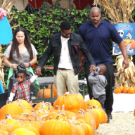 Usher takes his sons Usher Raymond V and Naviyd Ely Raymond to Mr. Bones Pumpkin Patch, Los Angeles, America - 14 Oct 2010