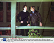 U.S. President George W. Bush and his wife, Laura,  greet British Prime Minister Tony Blair and his wife, Cherie, at Camp David. Thurmont, MD - February 23, 2001