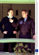 U.S. President George W. Bush and his wife, Laura,  greet British Prime Minister Tony Blair and his wife, Cherie, at Camp David. Thurmont, MD - February 23, 2001