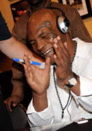 Mike Tyson autograph signing at Paint With Oil, Las Vegas, America - 16 Oct 2010