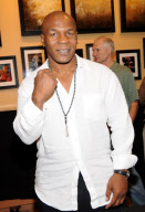 Mike Tyson autograph signing at Paint With Oil, Las Vegas, America - 16 Oct 2010