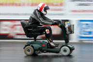Colin Furze sets new world record on world's fastest mobility scooter, Santa Pod raceway, Northamptonshire, Britain