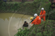 91-year-old grandmother trapped in muddy pool for 10 hours, Chongqing, China - 17 Apr 2010