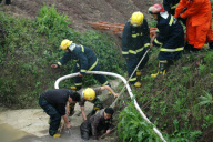 91-year-old grandmother trapped in muddy pool for 10 hours, Chongqing, China - 17 Apr 2010