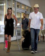 Dennis Quaid Arrives with Broken Footed Wife at LAX