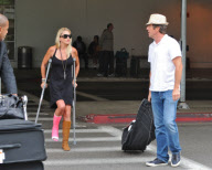 Dennis Quaid Arrives with Broken Footed Wife at LAX