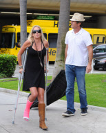 Dennis Quaid Arrives with Broken Footed Wife at LAX