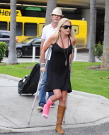 Dennis Quaid Arrives with Broken Footed Wife at LAX