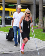Dennis Quaid Arrives with Broken Footed Wife at LAX