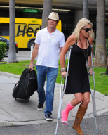 Dennis Quaid Arrives with Broken Footed Wife at LAX