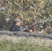 Angelina Jolie works out a firearm bunker scene