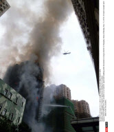CHINA: Shanghai Teachers' Apartment Building Fire Accident