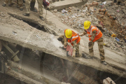 New Delhi building collapses killing at least 64  and around 80 people