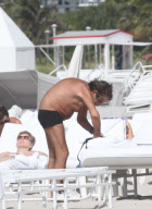 Designer Roberto Cavalli doesn't look like he needs any more sun as he tans in Miami
