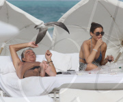 Designer Roberto Cavalli doesn't look like he needs any more sun as he tans in Miami
