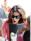 Yawning actress EVA LONGORIA doesn't cover her open mouth while having lunch with friends at 'Cafe Med'