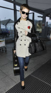 EXC EMMA WATSON AT HEATHROW