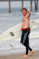 Sam Trammell Surfs In Venice Beach