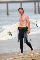 Sam Trammell Surfs In Venice Beach