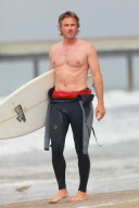 Sam Trammell Surfs In Venice Beach