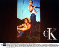 Royal Opera House Calvin Kline Projection. Supermodel Kate Moss In The Latest Calvin Klein Jeans Advert. 50 Ft Tall Projections Of Models Wearing Calvin Klein Clothes Will Look Out On One Side Of The Royal Opera House Over Drinkers And Diners In Cove