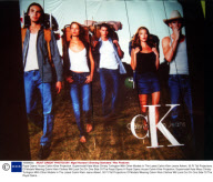 Royal Opera House Calvin Kline Projection. Supermodel Kate Moss Christy Turlington With Other Models In The Latest Calvin Klein Jeans Advert. 50 Ft Tall Projections Of Models Wearing Calvin Klein Clothes Will Look Out On One Side Of The Royal Opera H
