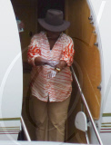 EXCLUSIVE - Oprah flies private while audience winners take commercial in Australia