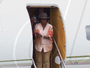 EXCLUSIVE - Oprah flies private while audience winners take commercial in Australia