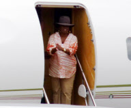 EXCLUSIVE - Oprah flies private while audience winners take commercial in Australia