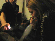 Miley Cyrus hits the bong like a champ
