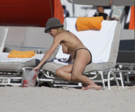 French TV STAR , Claire Chazal in Miami Beach with boyfriend during Christmas vacations