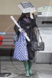 Rachel Bilson shooping in the rain, Los Feliz, Los Angeles, America - 21 Dec 2010